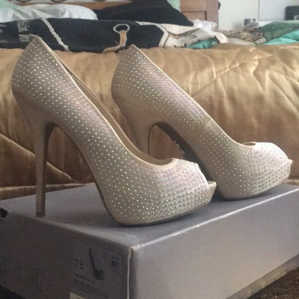 Blush platform heels by Jennifer Lopez